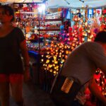 lightweight souvenir stall in night market Thailand